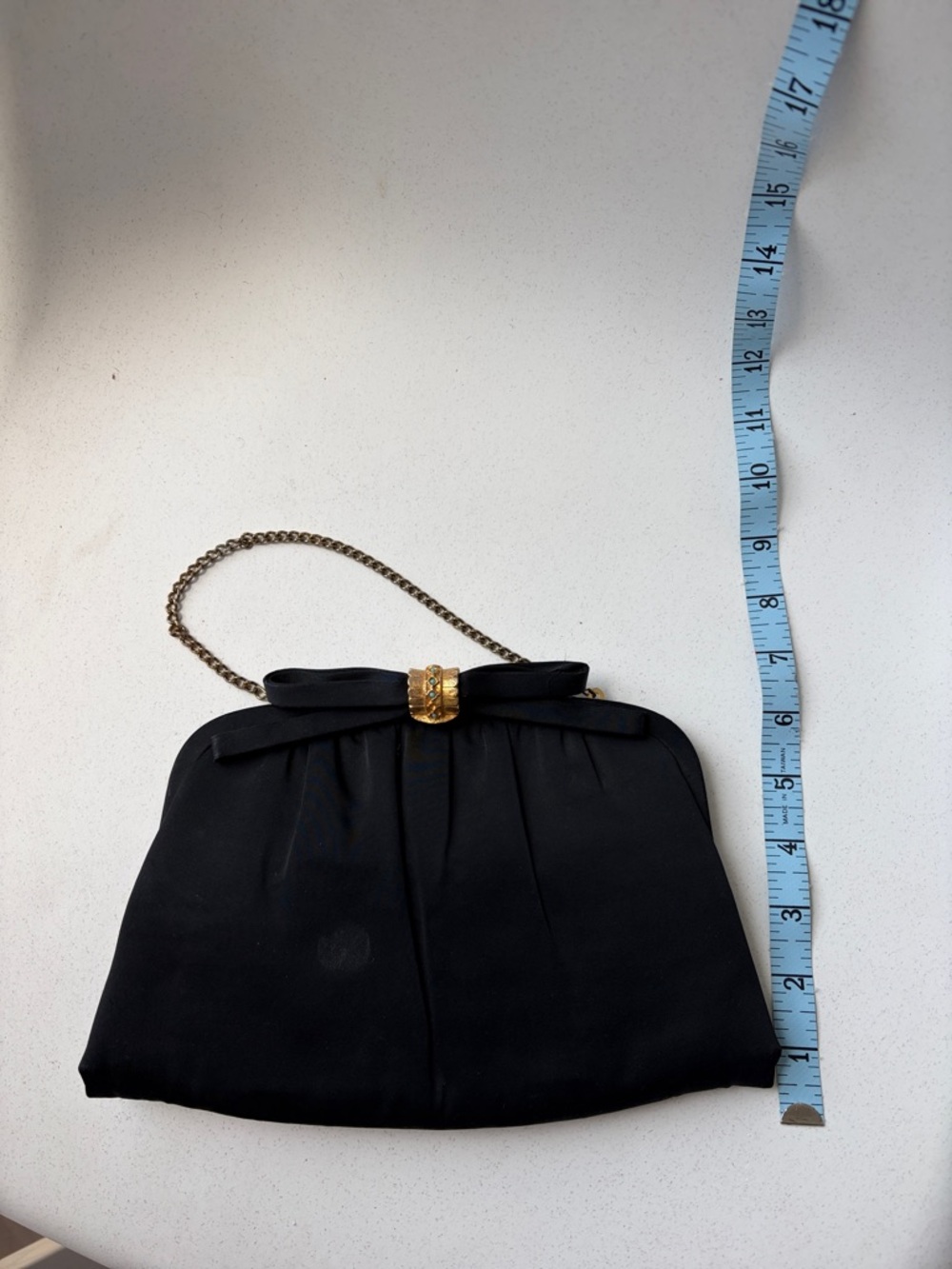 Sophisticated Black Evening Clutch with Gold Chain and Bow Detail
